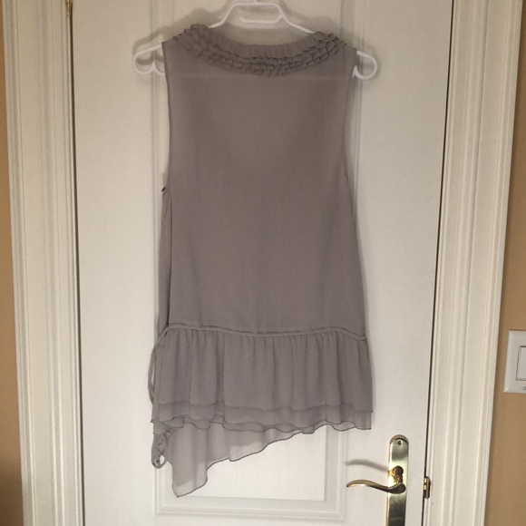 Asymmetrical summer top with bow detail. - Picture 2 of 4